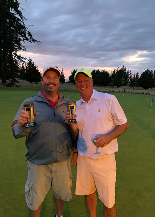 Peninsula Golf Club members celebrating on the putting green in Port Angeles, Washington